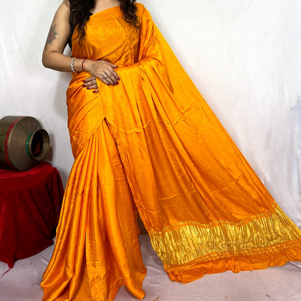 modal silk plan dye saree with zari pallu