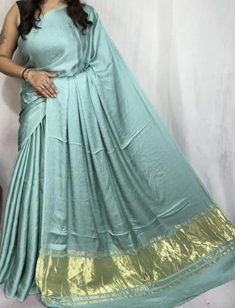 modal silk plan dye saree with zari pallu